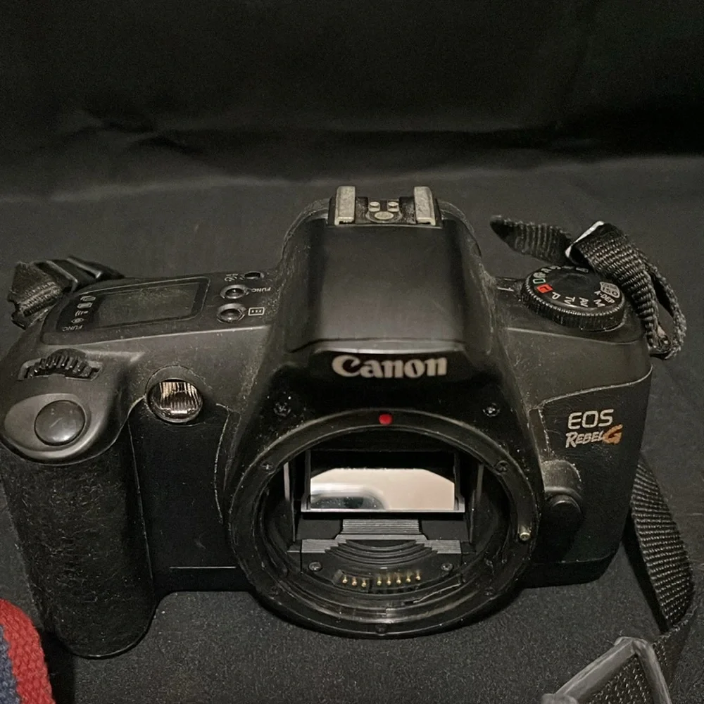 Canon EOS Revel G 35mm film camera with case.